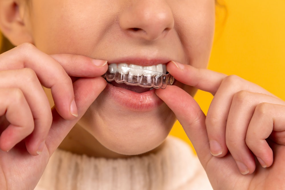 child wearing clear aligners