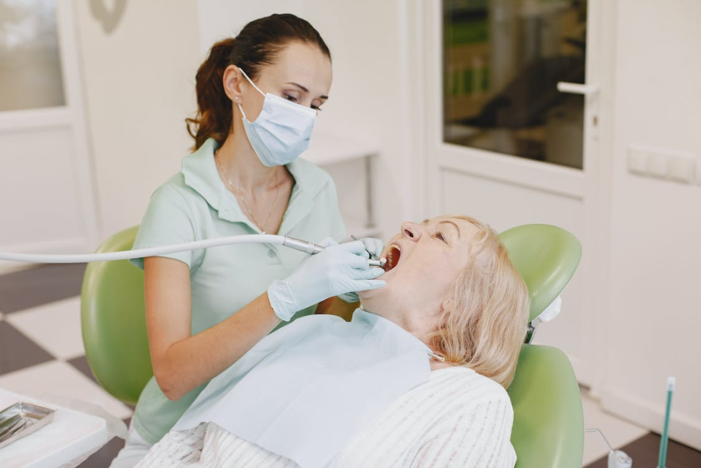 dentist at work on an adult